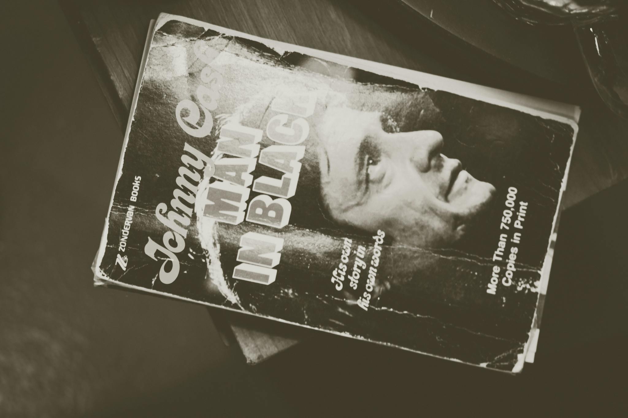 Old book cover featuring biography of a legendary musician in sepia tone.